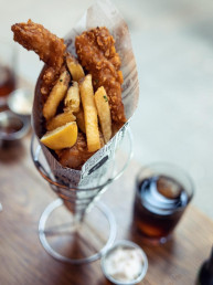 food in glass beside mug